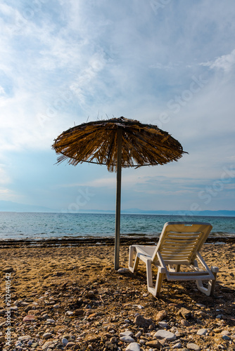 beach chairs and umbrella