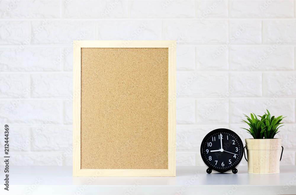 mock up Blank Cork board with Watch,Green plants on white brick wall Stock  Photo | Adobe Stock