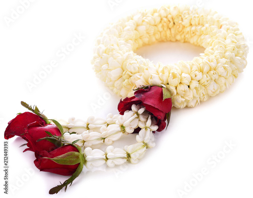 Fresh jasmine flowers garland on white background.