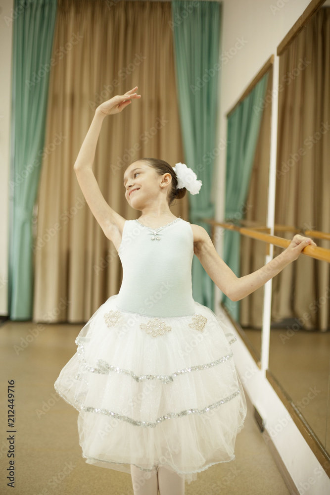 Little ballerina in ballet studio Little ballerina in ballet studio