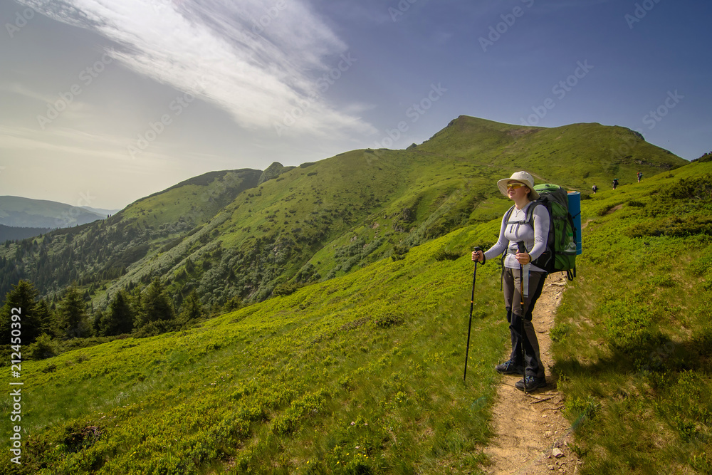 A girl hikers in the Carpathian mountains. Ukraine