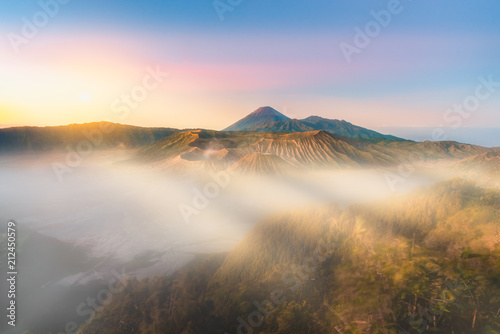 Mount Bromo volcano (Gunung Bromo) with sunrise colorful sky dawn at Bromo Tengger Semeru National Park, East Java, Indonesia. © sakarin14