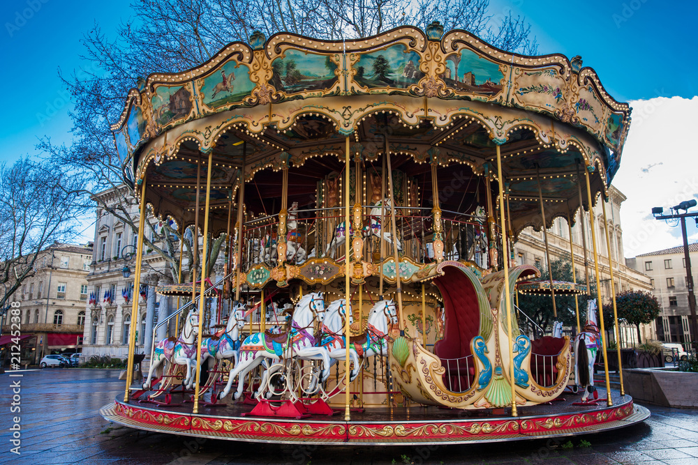 French old-fashioned style carousel with stairs at Place de l'Horloge in  Avignon France Stock Photo | Adobe Stock