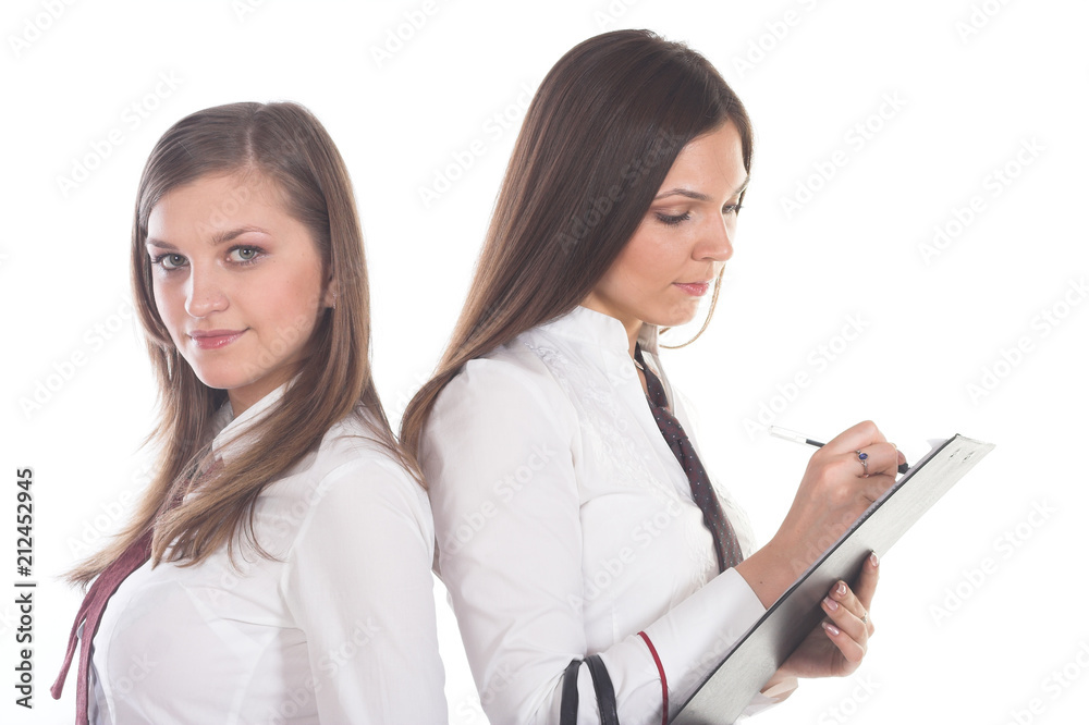 two attractive business women on white background two attractive business women on white background