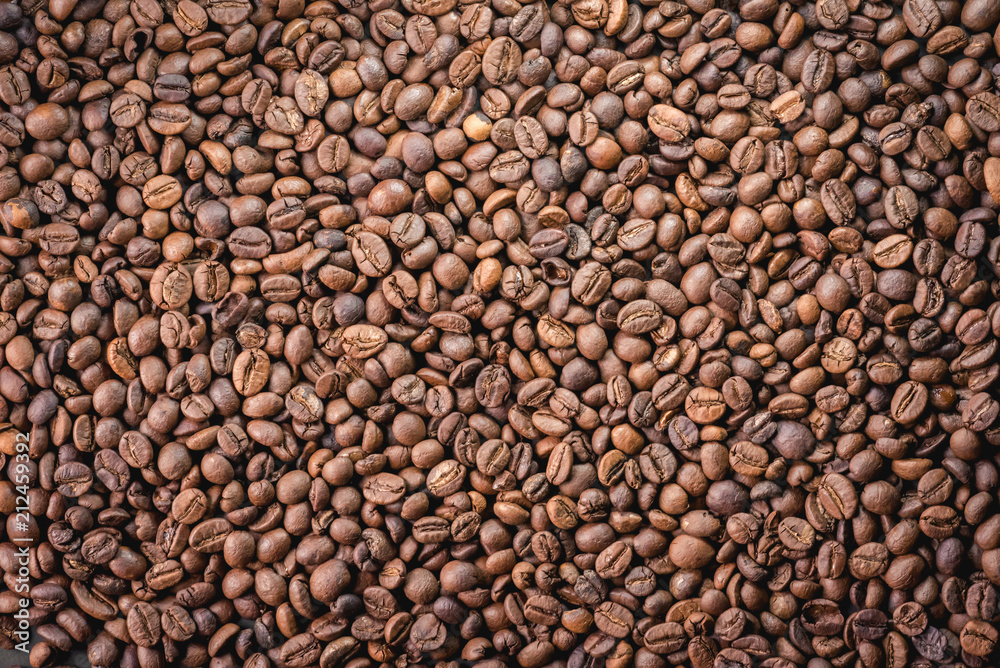 Close up of coffee beans are the background. Close up of coffee beans are the background.
