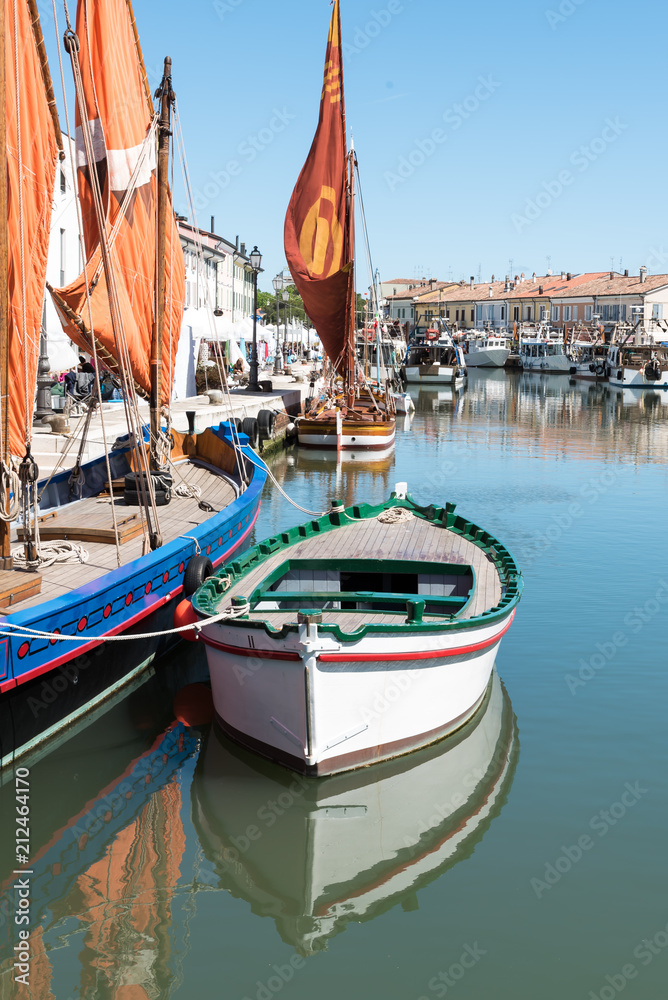 Historic sailing boats in the port of Cesenatico Italy