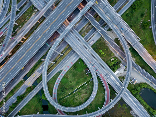 Top view of Highway road junctions. The Intersecting freeway road overpass the eastern outer ring road of Bangkok, Thailand.