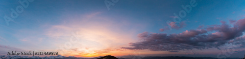Sunset sky above mountains © wildman
