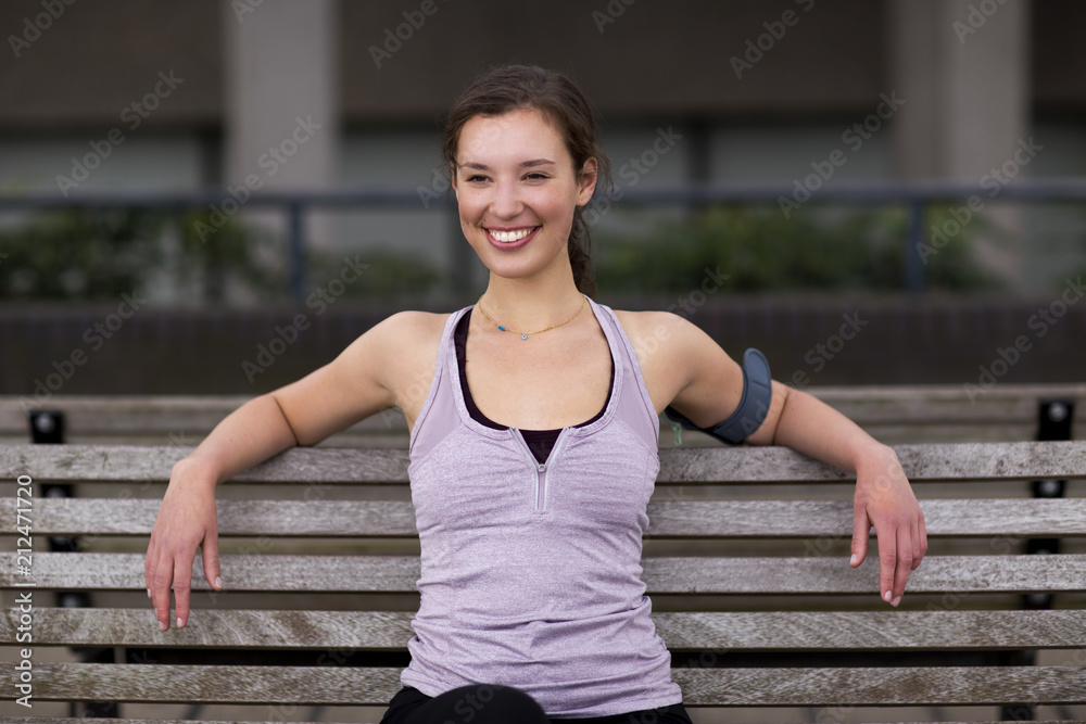 firness woman enjoying a break from running