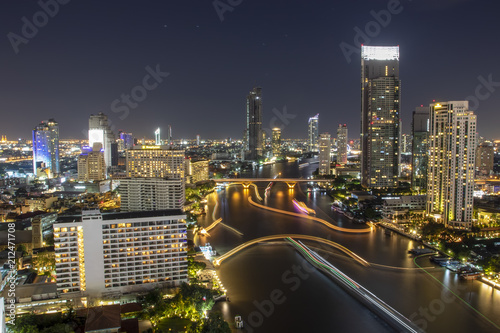 City view at night In Bangkok The Chao Phraya River.
