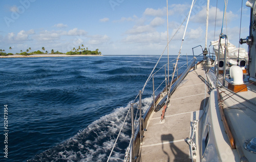 sailing yacht passing the t...