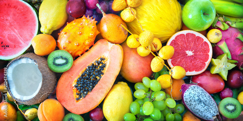 Assortment of colorful ripe tropical fruits. Top view