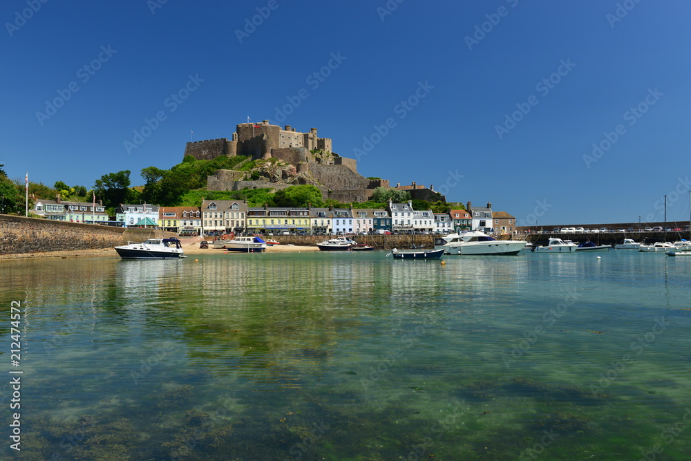 Gorey Castle, Jersey, U.K. July 7th 2018, Medieval 12th century landmark and harbor in the Summer, residence of Sir Walter Raleigh in the 1600's.