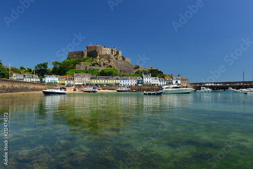 Gorey Castle, Jersey, U.K. July 7th 2018, Medieval 12th century landmark and harbor in the Summer, residence of Sir Walter Raleigh in the 1600's. photo