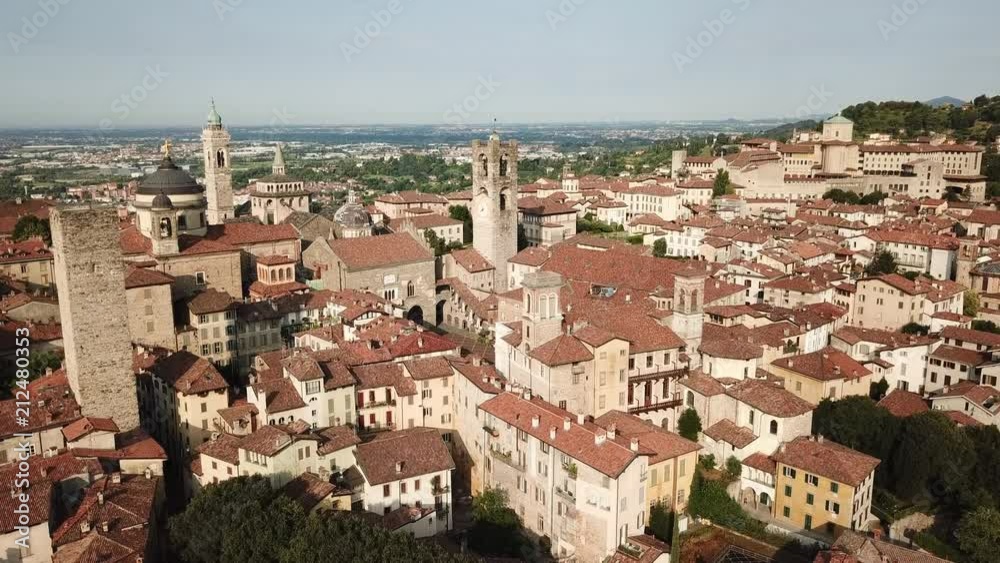 Drone aerial view of Bergamo - Old city. One of the beautiful town in Italy. Landscape to the city center and its historical buildings Drone aerial view of Bergamo - Old city. One of the beautiful town in Italy. Landscape to the city center and its historical buildings