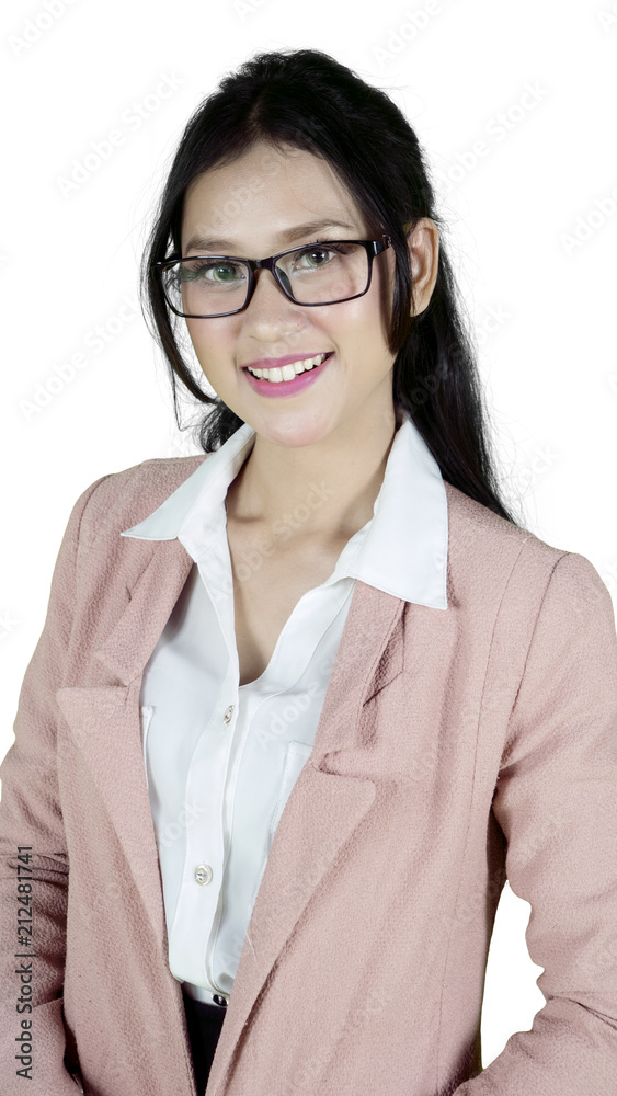 Female entrepreneur smiles at the camera on studio Female entrepreneur smiles at the camera on studio
