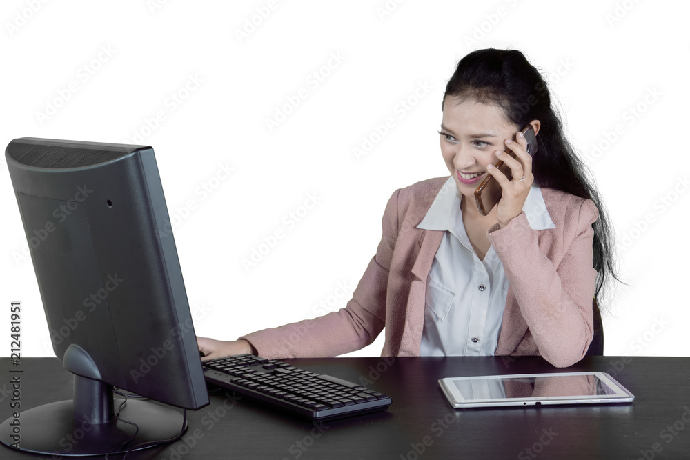 Female entrepreneur works with phone and computer Female entrepreneur works with phone and computer
