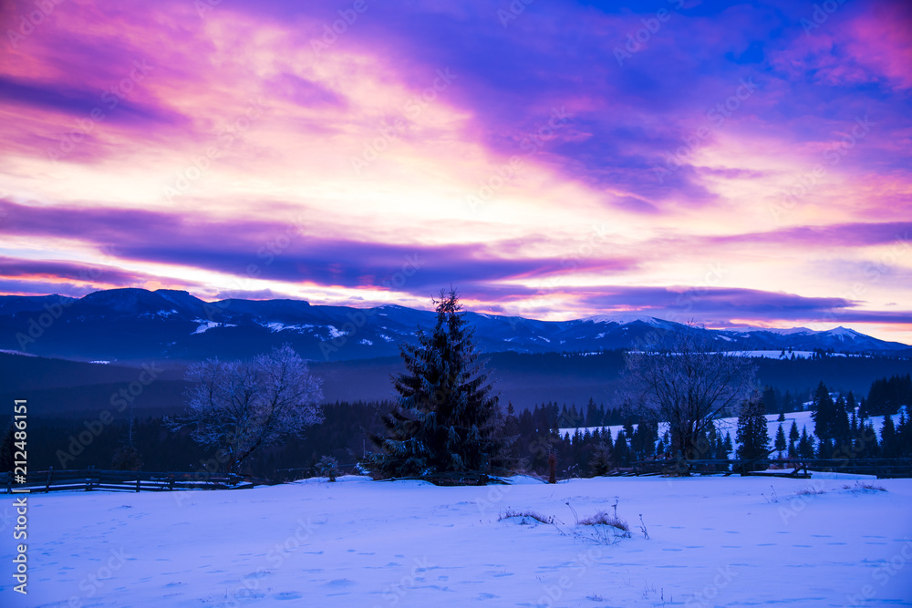 Fototapeta premium Winter clouds at the sunset
