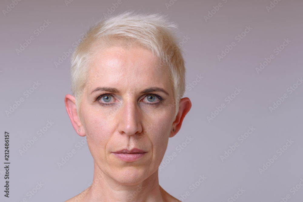 Frontal close up Portrait of a middle aged woman