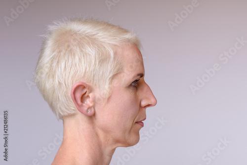 Side close up Portrait of a middle aged woman