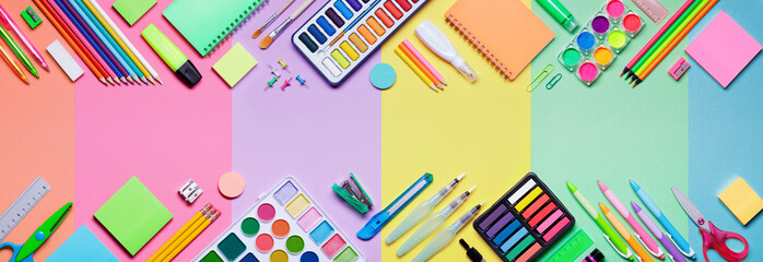 School Supplies With Colorful Paper Background - Education Banner
