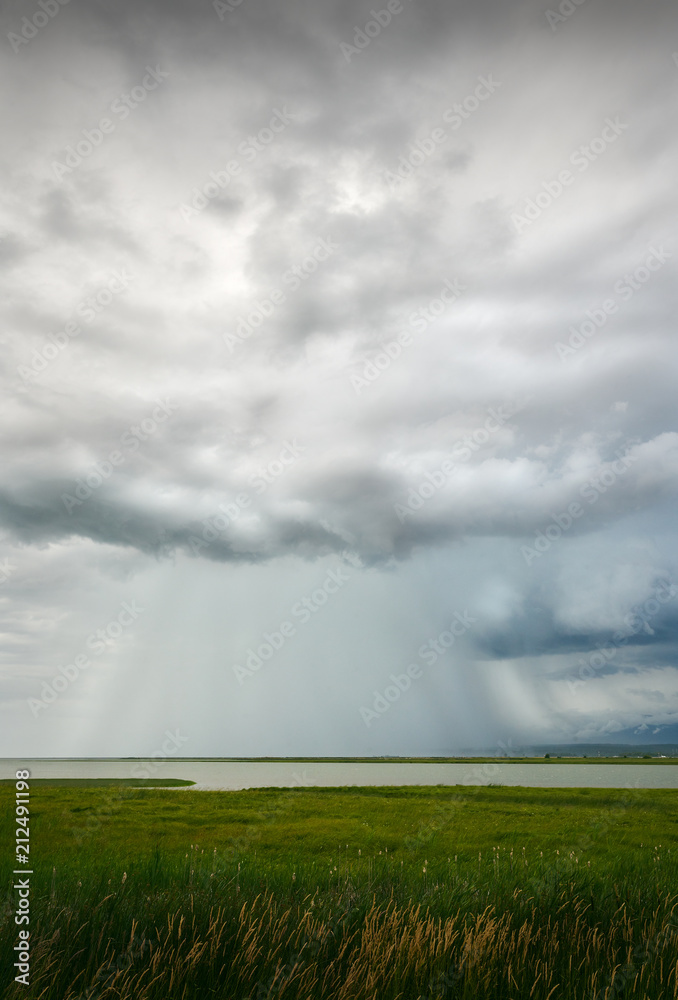 Thunderstorm Downpour. Storm clouds and rain over the Fraser River and the Vancouver Airport.
Thunderstorm Downpour. Storm clouds and rain over the Fraser River and the Vancouver Airport.