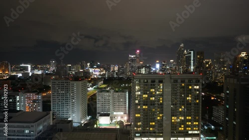 Bangkok, Thailand - Jul 3,2018 : Storm clouds with rain passing over sky of Bangkok cityscape. 4K Timelapse