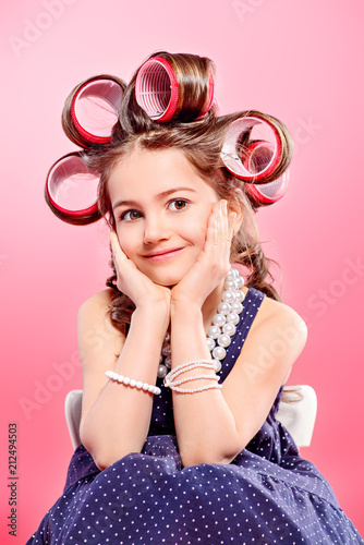 kid girl with curlers