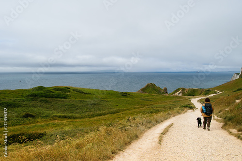 British Jurassic Coast with walking tourist