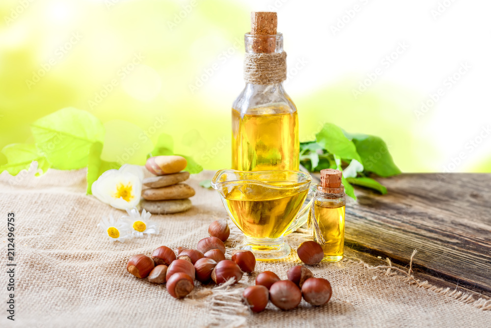 Vegetable oil hazelnut on a wooden table Vegetable oil hazelnut on a wooden table