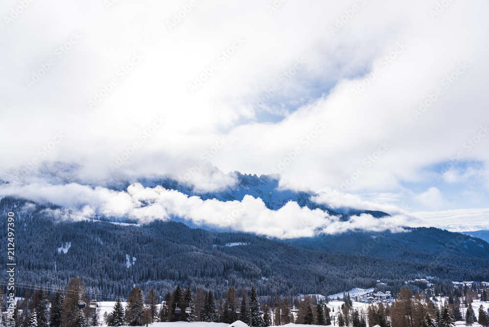 Winter clouds in Dolomites mountains