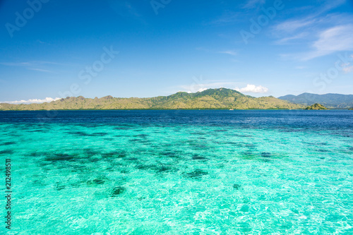 Two Different Color of Clear Turquoise and Blue Sea at Taka Makassar Island in Komodo National Park, Indonesia