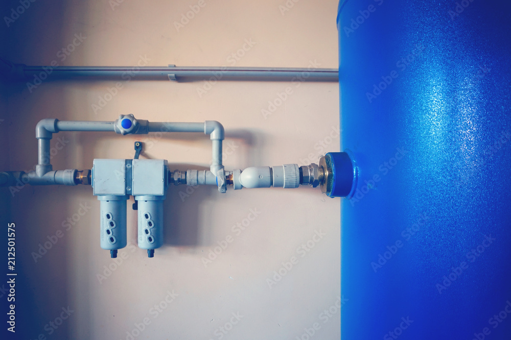 Control air valve, cock, valve, reservoir of air compressor using plastic pipe at the power plant in the enterprise. Control air valve, cock, valve, reservoir of air compressor using plastic pipe at the power plant in the enterprise.