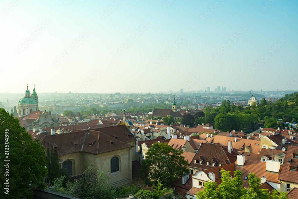 View of the tiled roofs of houses in the center of Prague