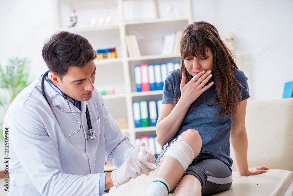 Fototapeta premium Patient visiting doctor after sustaining sports injury