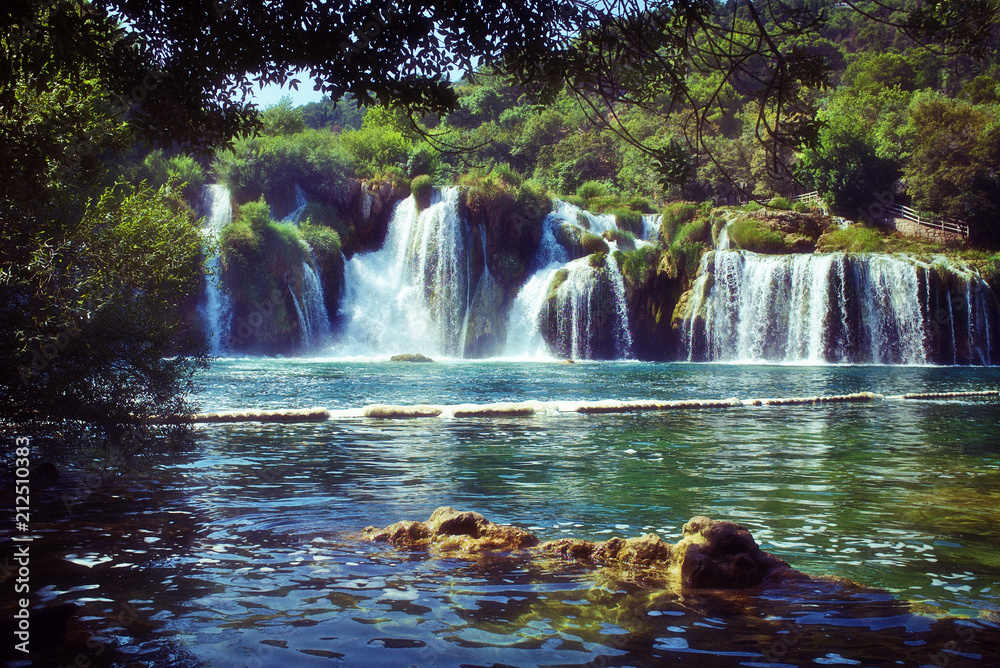 Waterfalls in Krka National Park in Croatia – With a  retro style purple film  technique