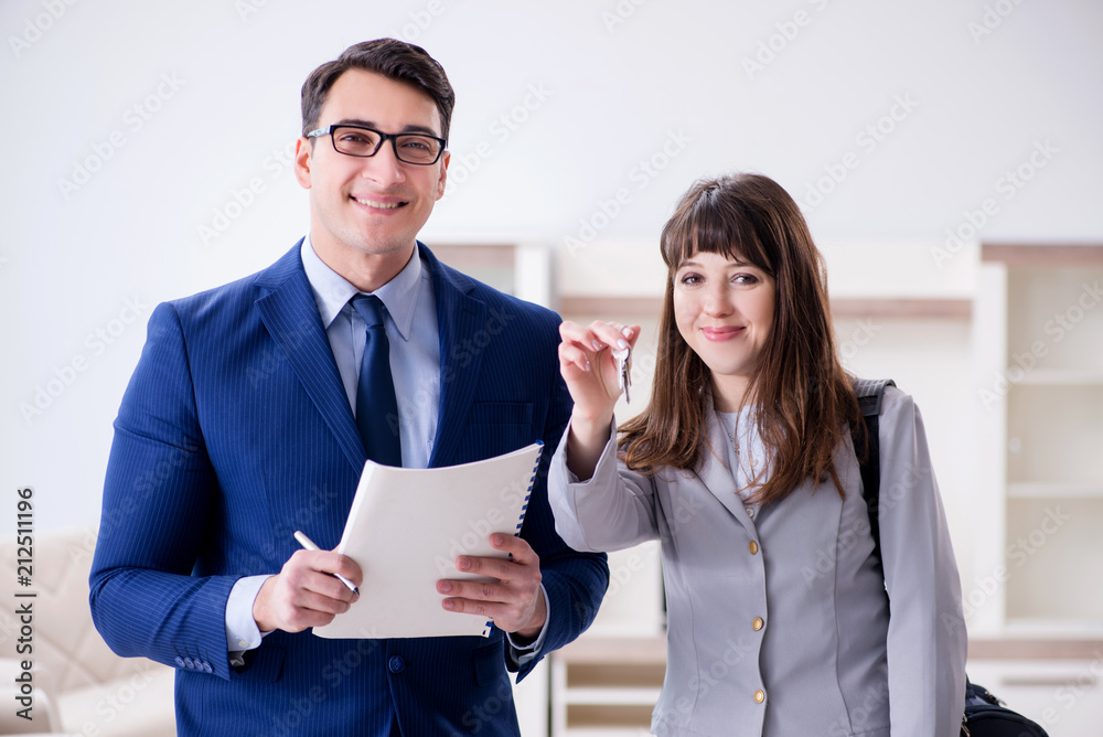 Real estate agent showing new apartment to owner Real estate agent showing new apartment to owner