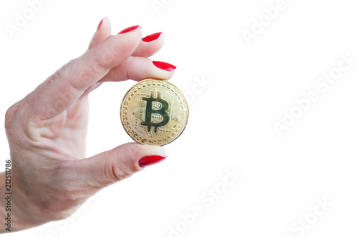 virtual money golden bitcoin women hand with red nails fingers isolated on white background