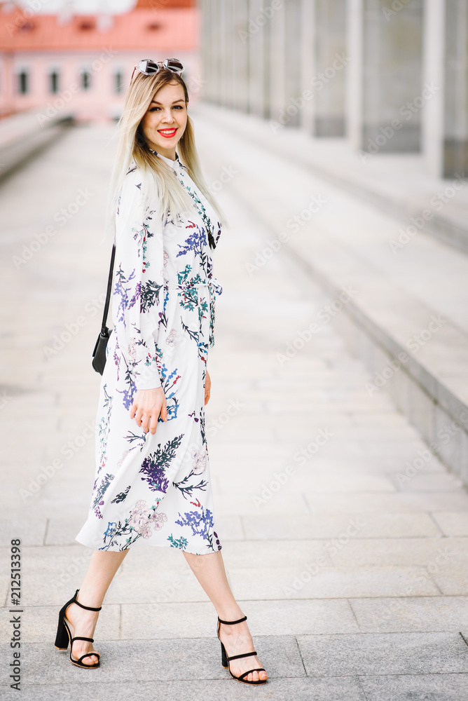 portrait of a beautiful young girl in an outdoor dress portrait of a beautiful young girl in an outdoor dress