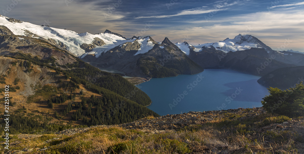 Panoramic Landscape View of Garibaldi Lake and Distant Snowy Mountain Tops from Panorama Ridge in Coast Mountains of British Columbia Canada