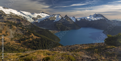 Panoramic Landscape View of Garibaldi Lake and Distant Snowy Mountain Tops from Panorama Ridge in Coast Mountains of British Columbia Canada