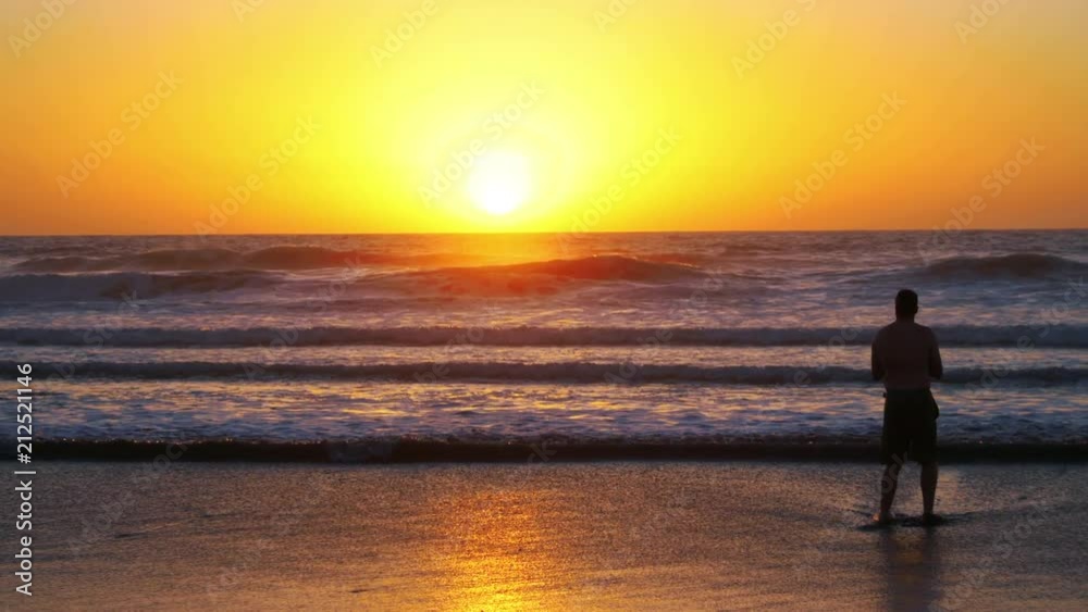 Man looking at sunset in Hawaii in 4K Man looking at sunset in Hawaii in 4K
