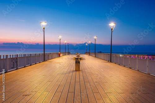 Concrete pier in Kolobrzeg, Poland. Long exposure shot at night