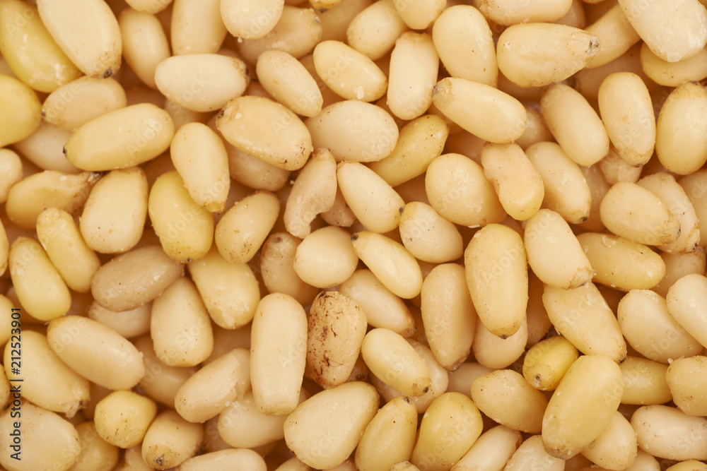 Surface coated with pine nuts
