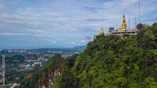 Buddha on the top Mountain of Wat Tham Seua (Tiger Cae) , Krabi,Thailand