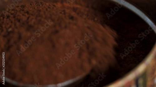 coffees poon into coffee powder photo