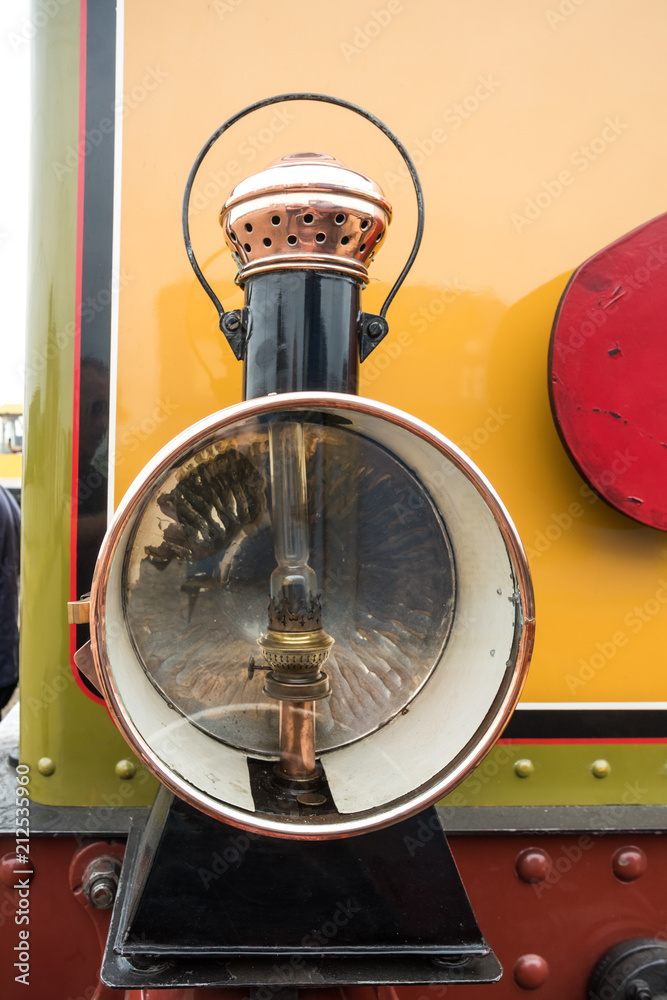 old steam train with a large oil lamp Stock Photo | Adobe Stock