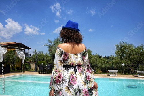 woman by the pool © robypangy