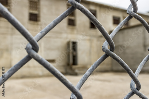 Wire fence surrounding the exercise yard for death row inmates at the Idaho State Penitentiary, Boise, Idaho, USA.