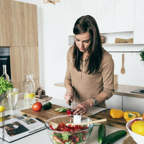 Woman cooking vegetable summer salad home kitchen Healthy food home